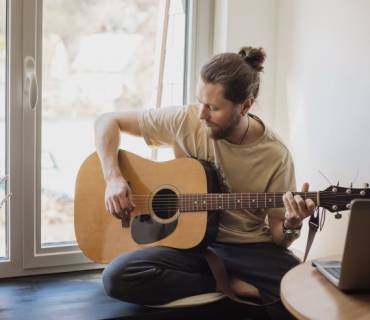 ritmo strumming chitarra